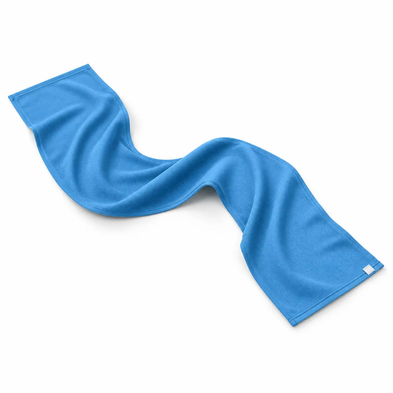 Blue cooling fabric sports towel arranged in a flowing S shape on a white background