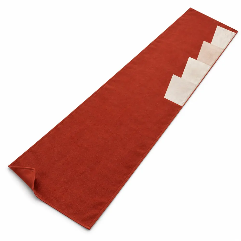 YJ-111 brick-red microfiber yoga towel with a pale stepped-edge print on white