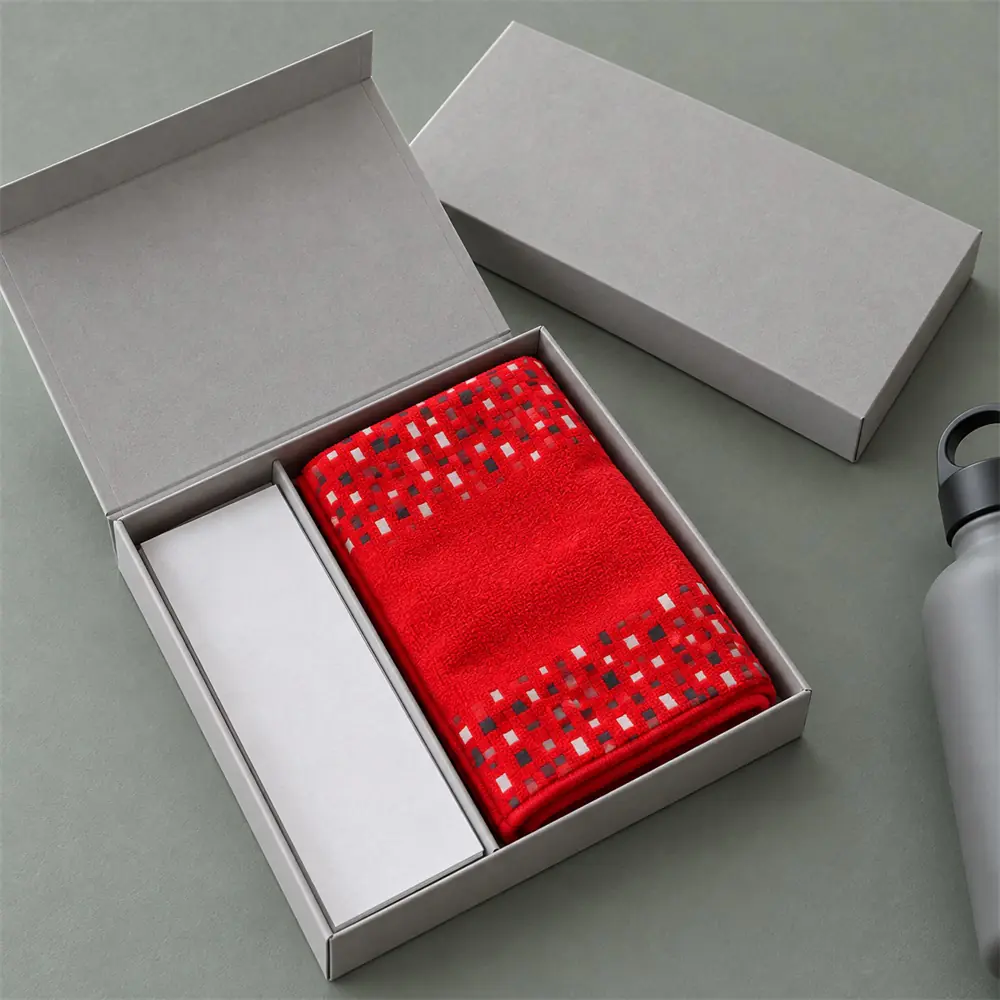 YJ-206 optional carton packing Folded red geometric sport towel in an open light gray slim carton