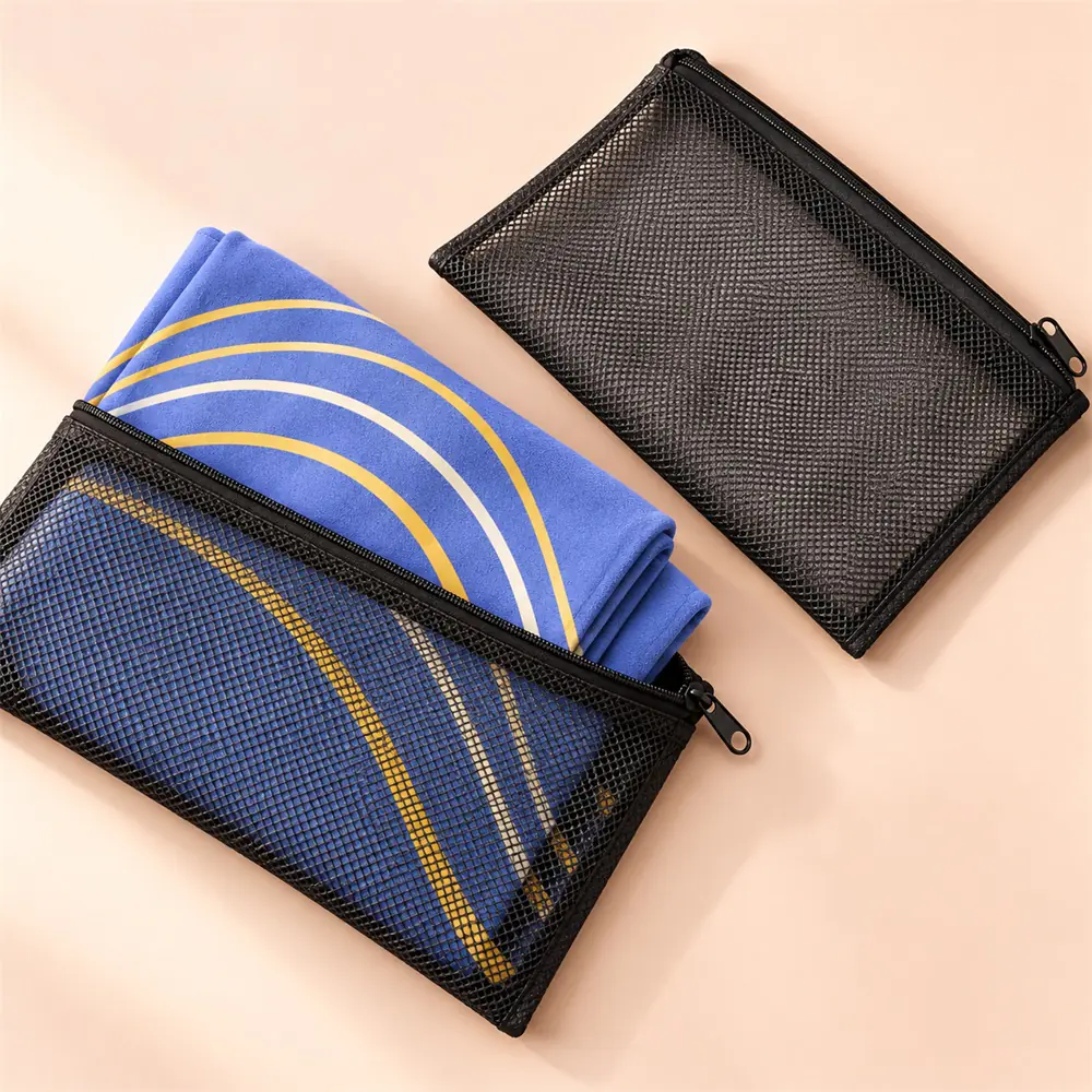 YJ-207 optional mesh pouch Folded periwinkle contour-print towel partly inside a charcoal mesh zip pouch